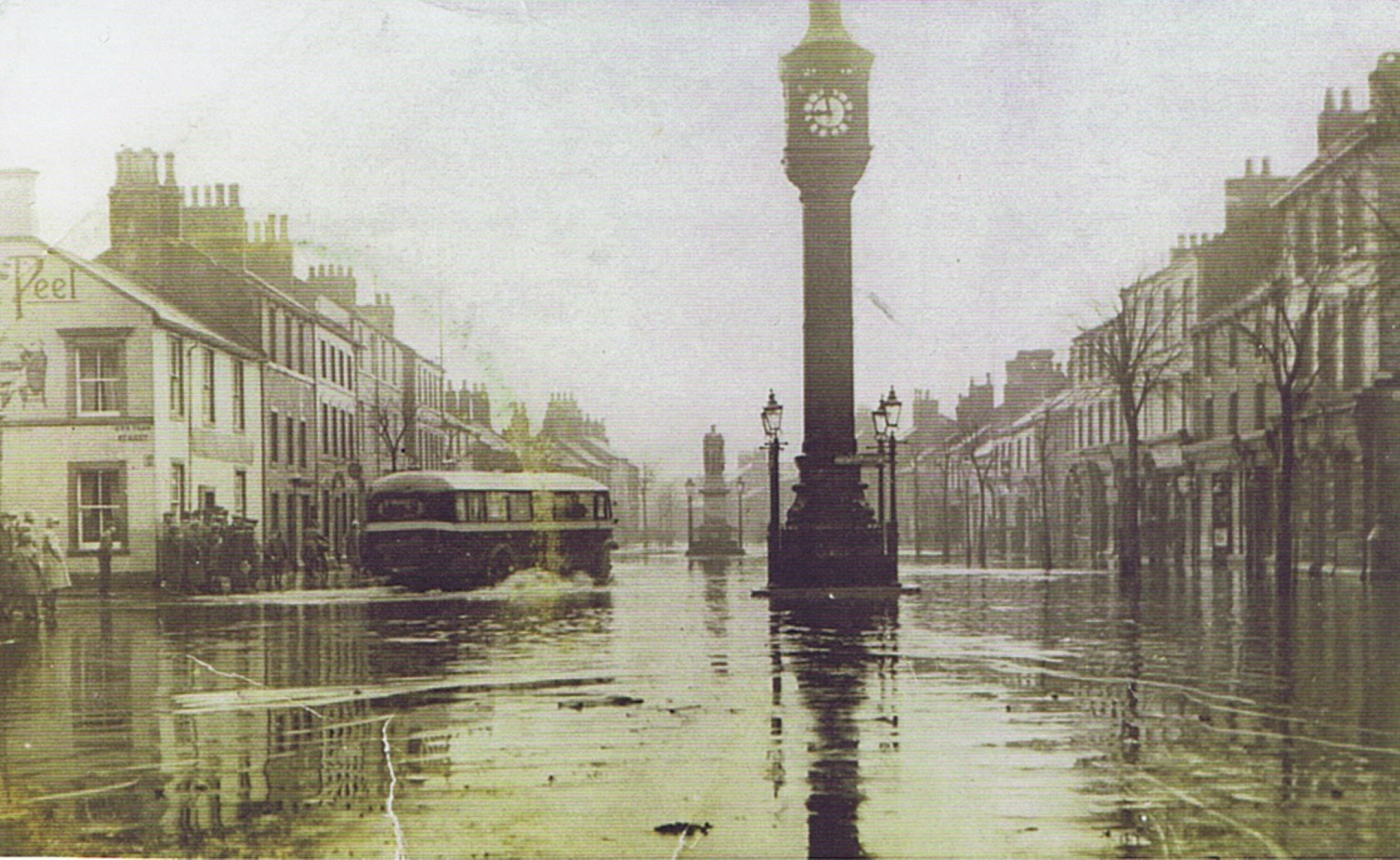 Main Street 37 Brown Cow flood bus gets through clock tower demolished 1932 p2