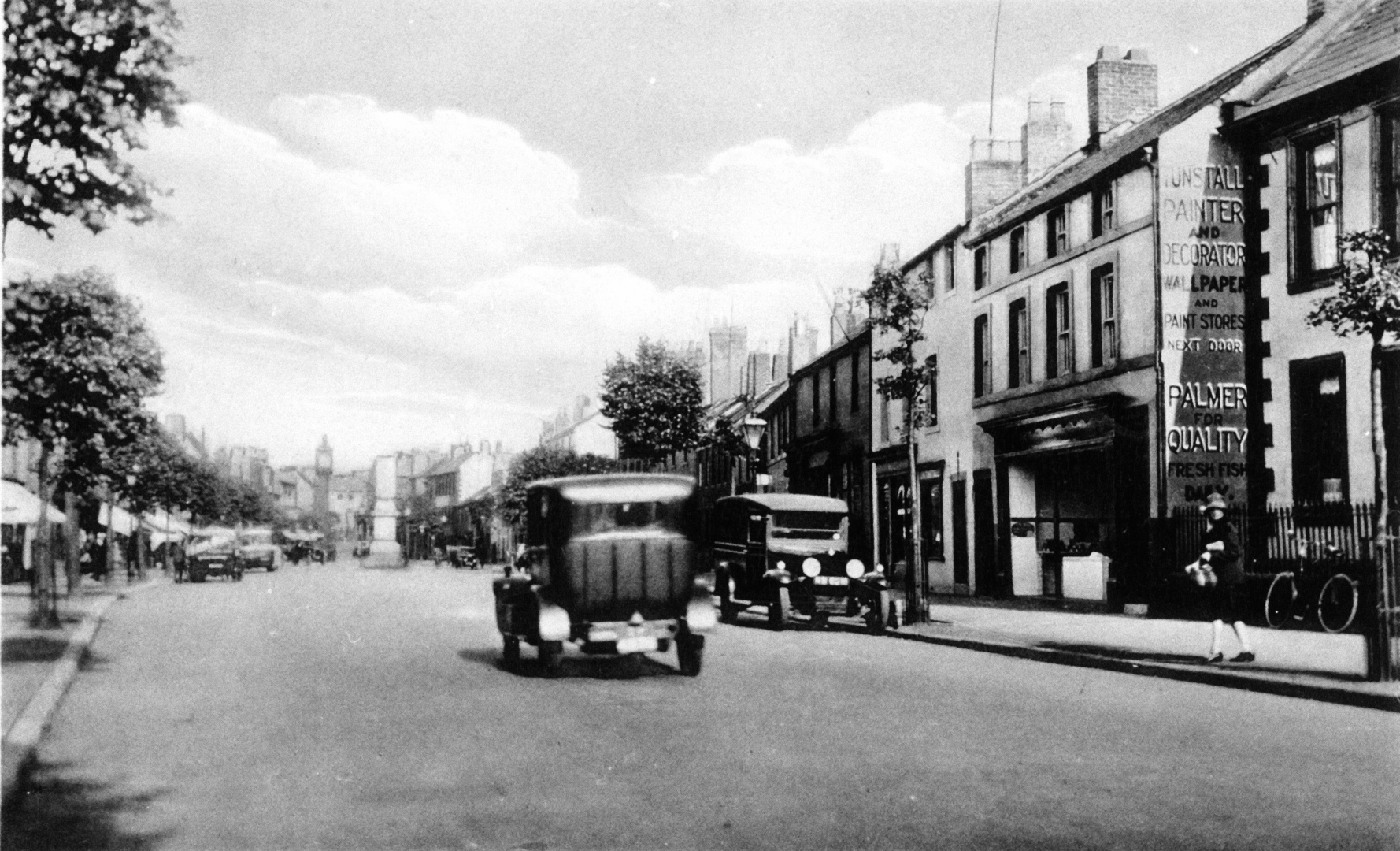 Main Street 69 Palmers wet fish shop Tunstall Decorator wall advert Mayo clock tower cars pre 1932 p2